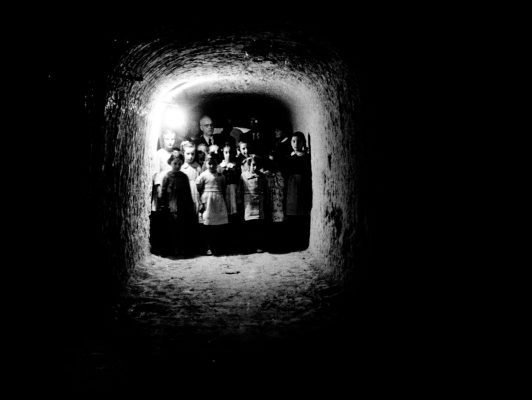 PAR72756 Children take refuge in underground shelters to escape Fascist bombings. Island of Minorca, Spain, 1938
